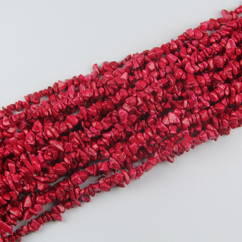 stacked coils of red turquoise bead strand, 31.5 inches long, irregular round 5-8mm beads on nylon cord