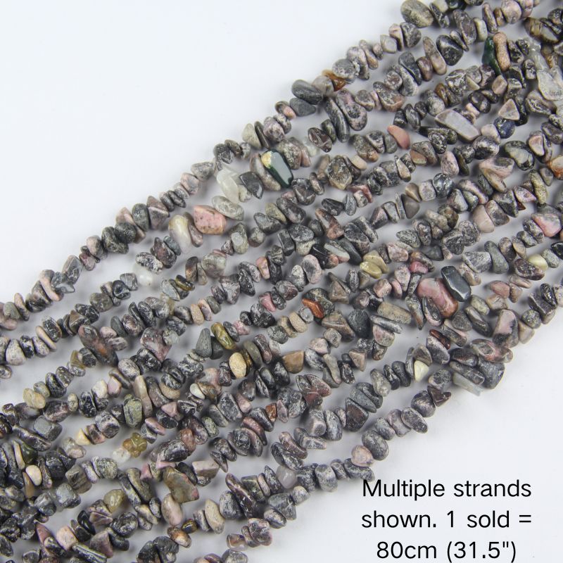 Multiple strands of 31.5" Red Vein Agate irregular chip beads (5-8mm) displayed as the cover image. Natural striped textures. Note: 1 strand sold per order.