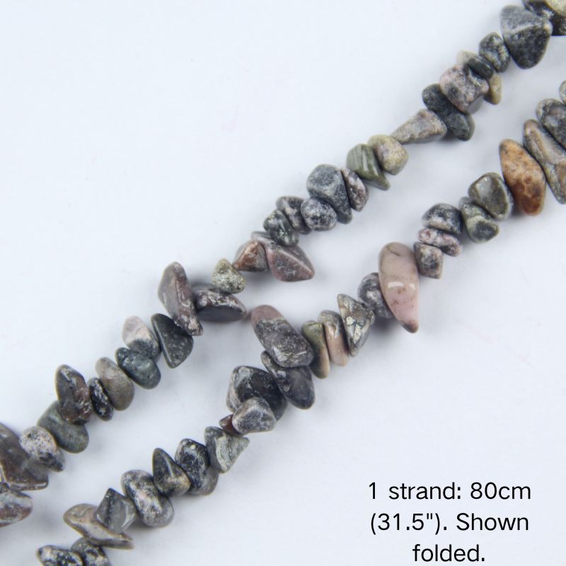 A single 80cm (31.5") strand of Red Vein Agate irregular chip beads, folded to display actual length and strong nylon cord. Perfect for jewelry making.