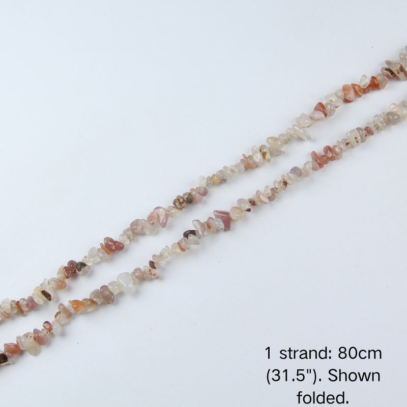 A single 80cm (31.5") strand of Red & White Agate irregular chip beads, folded to display actual length and strong nylon cord. Perfect for jewelry making.