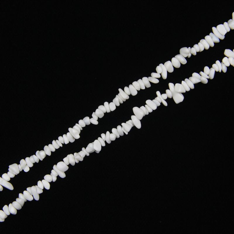 One full 31.5-inch strand of irregular white porcelain beads against a clean background, 5-8mm bead width, hand-threaded on durable nylon cord.