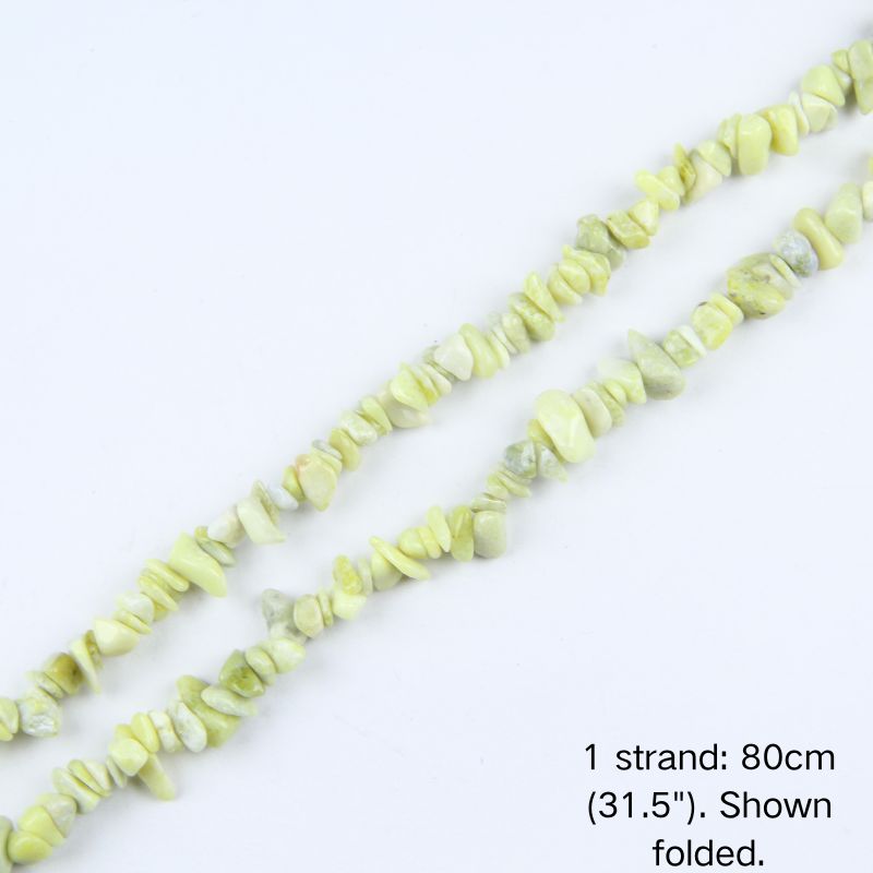 Single folded strand of 80cm natural lemon jade irregular crushed nugget beads.