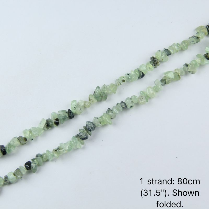 Single folded strand of 80cm natural pale green prehnite crushed nugget beads.