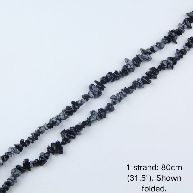 A single 80cm (31.5") strand of Snowflake Obsidian irregular chip beads, folded to display actual length and nylon cord for handmade jewelry.