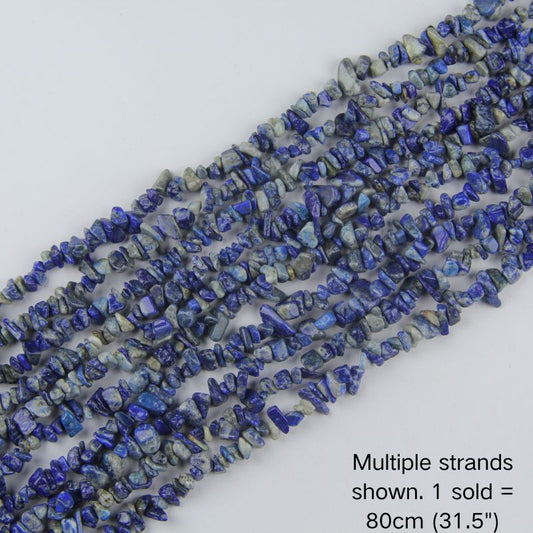 Multiple strands of natural sodalite chips, deep ocean blue with white veining, 31.5 inch beaded cord. 1 sold equals 1 strand (80cm).