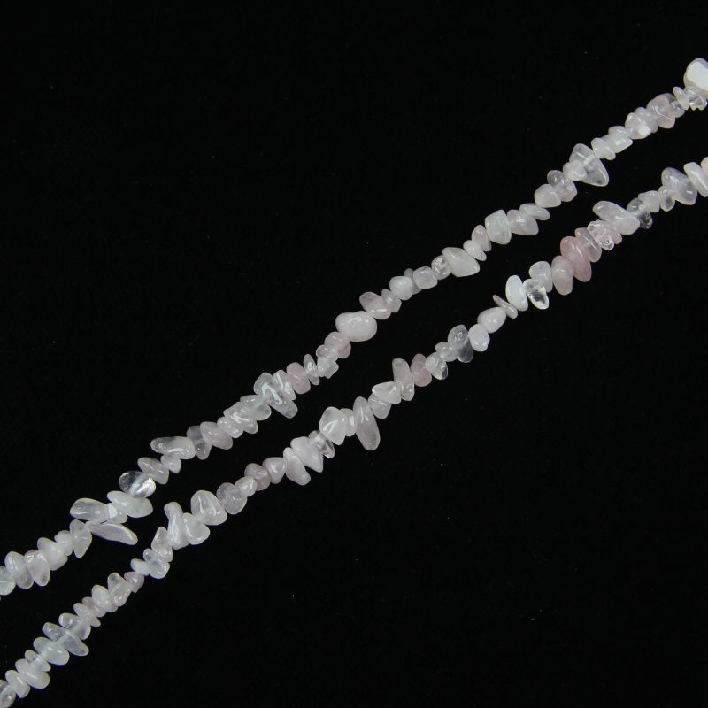 single flat lay of starry pink moissanite necklace strand, 31.5 inches, 5-8mm irregular round beads strung on nylon cord
