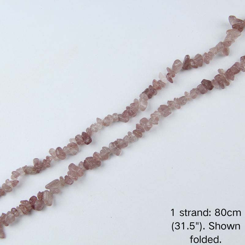 A single 80cm (31.5") strand of Strawberry Pink irregular crystal chip beads, shown folded to display actual length and nylon cord.