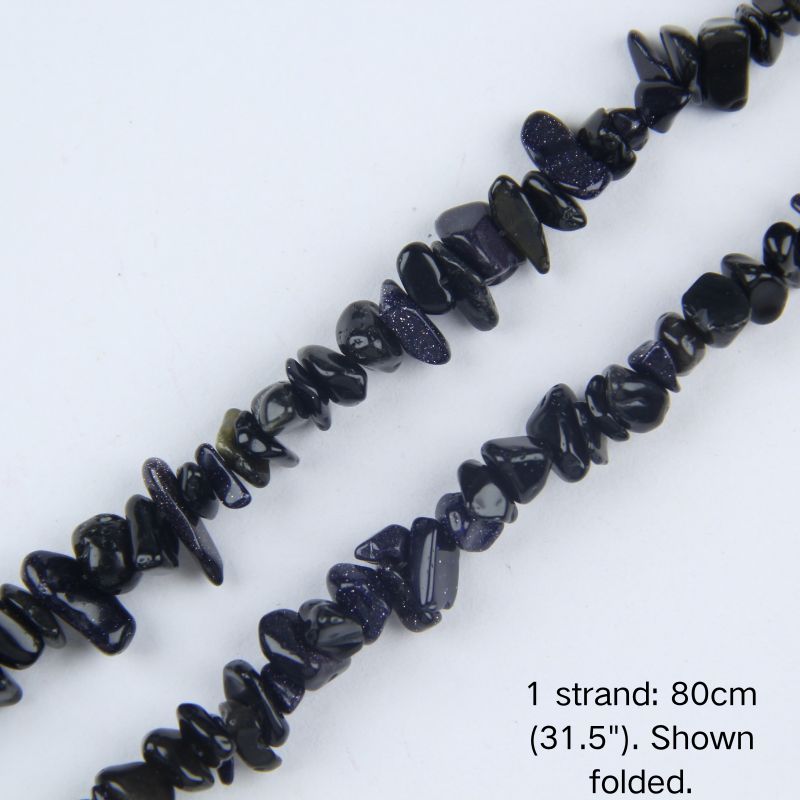 A single 80cm (31.5") strand of Synthetic Blue Sandstone chips, shown folded to display actual length.