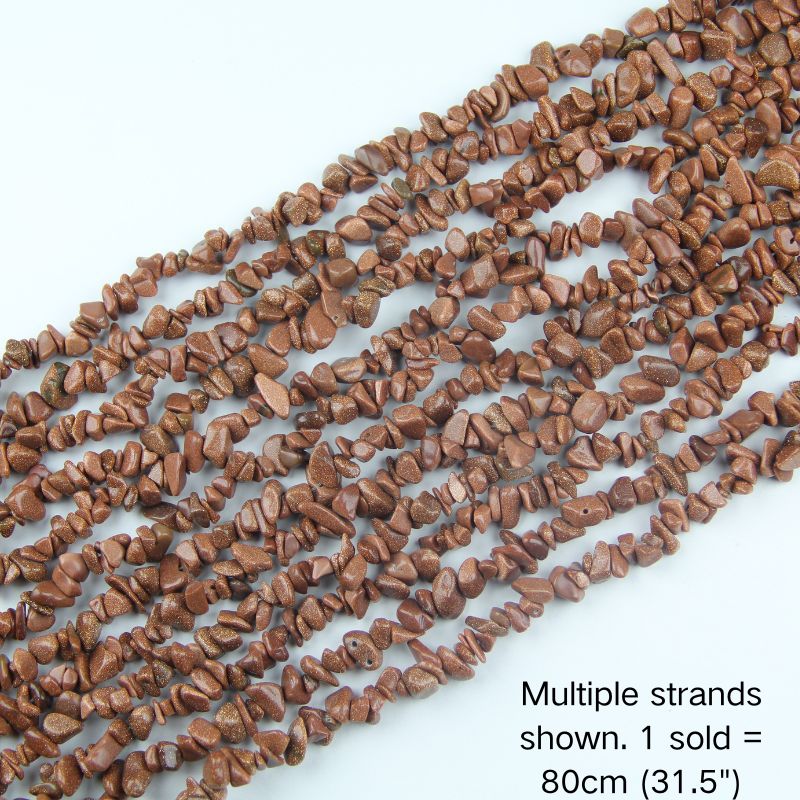 Multiple strands of 31.5" Synthetic Goldstone chips (5-8mm) displayed as the cover image. Note: 1 strand sold per order.
