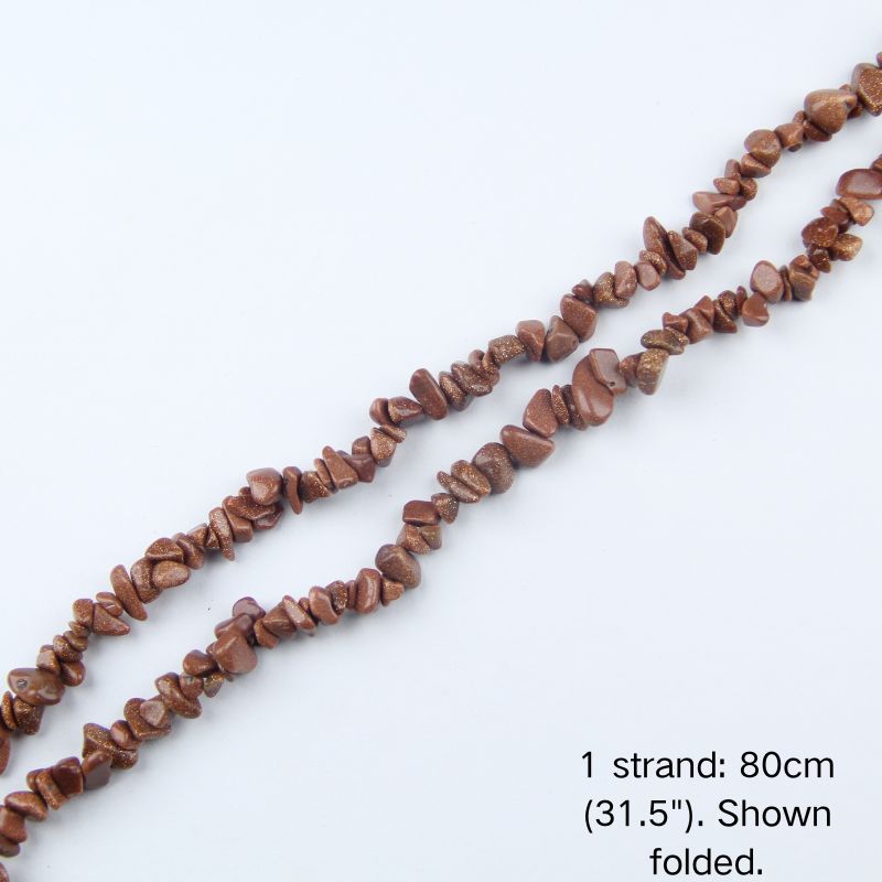A single 80cm (31.5") strand of Synthetic Goldstone chips, shown folded to display actual length.