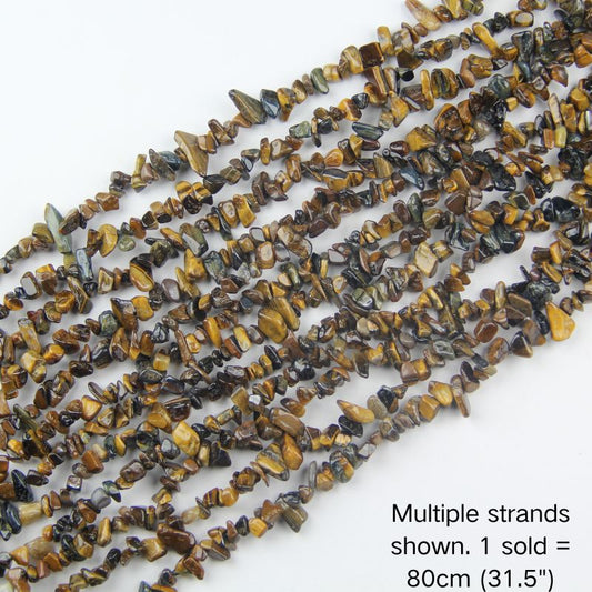 Multiple strands of natural tiger's eye chips, golden brown chatoyant stones, 31.5 inch beaded cord for jewelry making and boho home decor.