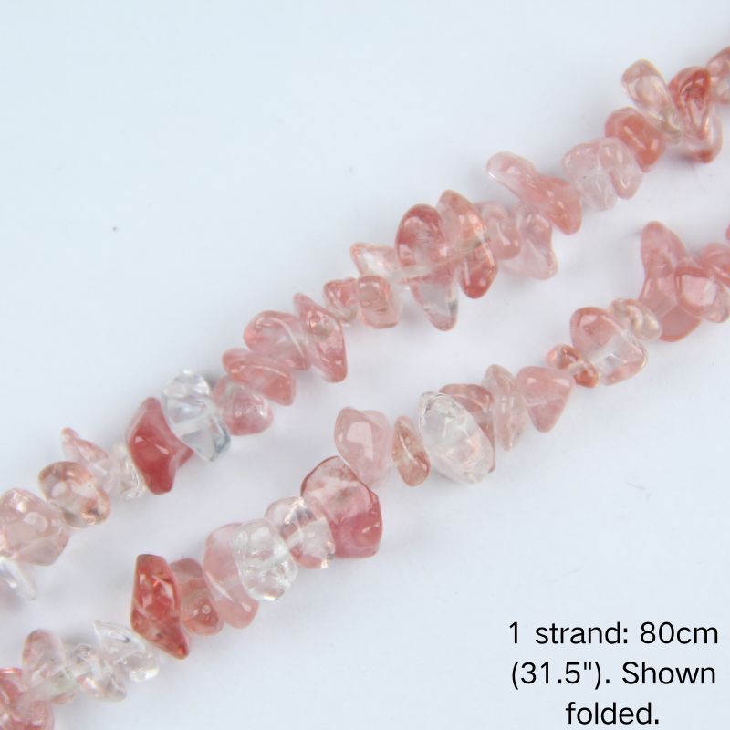 Macro close-up of glossy, bright Watermelon Red irregular crystal chip beads, showing rich pinkish-red colors, polished texture, and center-drilled holes.