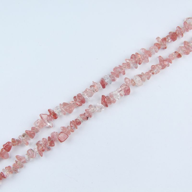 single flat lay of watermelon red crystal necklace strand, 31.5 inches, 5-8mm irregular round beads strung on nylon cord