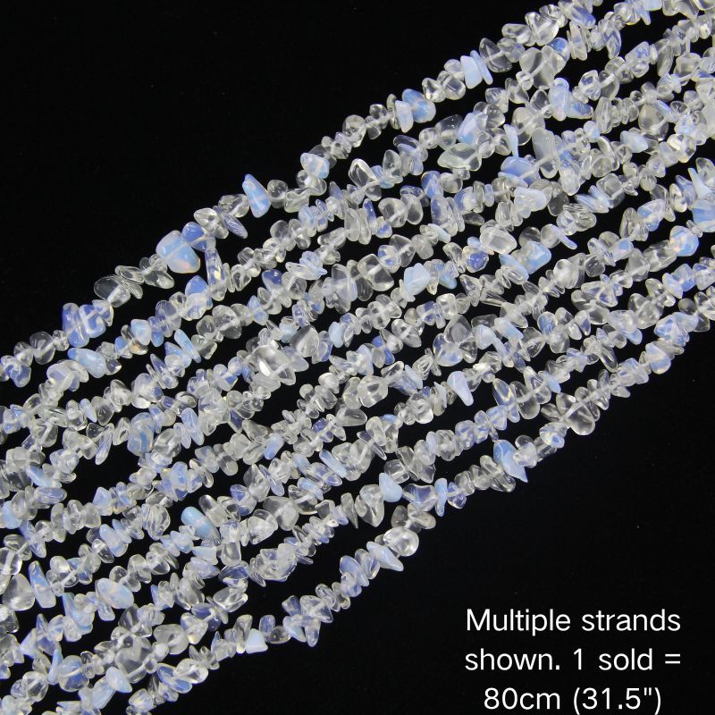 Multiple strands of 31.5" Synthetic White-Blue Opal chips (5-8mm) displayed as the cover image. Note: 1 strand sold per order.