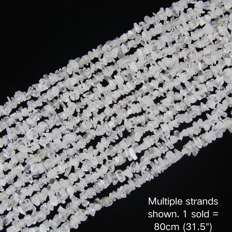 Multiple strands of 31.5" White Cotton irregular crystal chip beads (5-8mm) displayed as the cover image. Note: 1 strand sold per order.