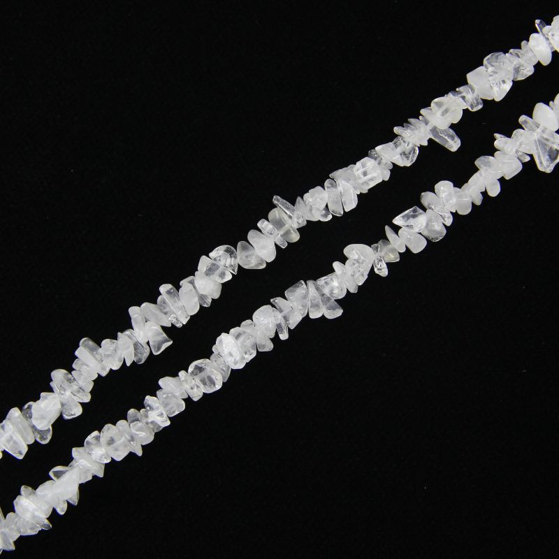 single flat lay of white cotton crystal necklace strand, 31.5 inches, 5-8mm irregular round beads strung on nylon cord
