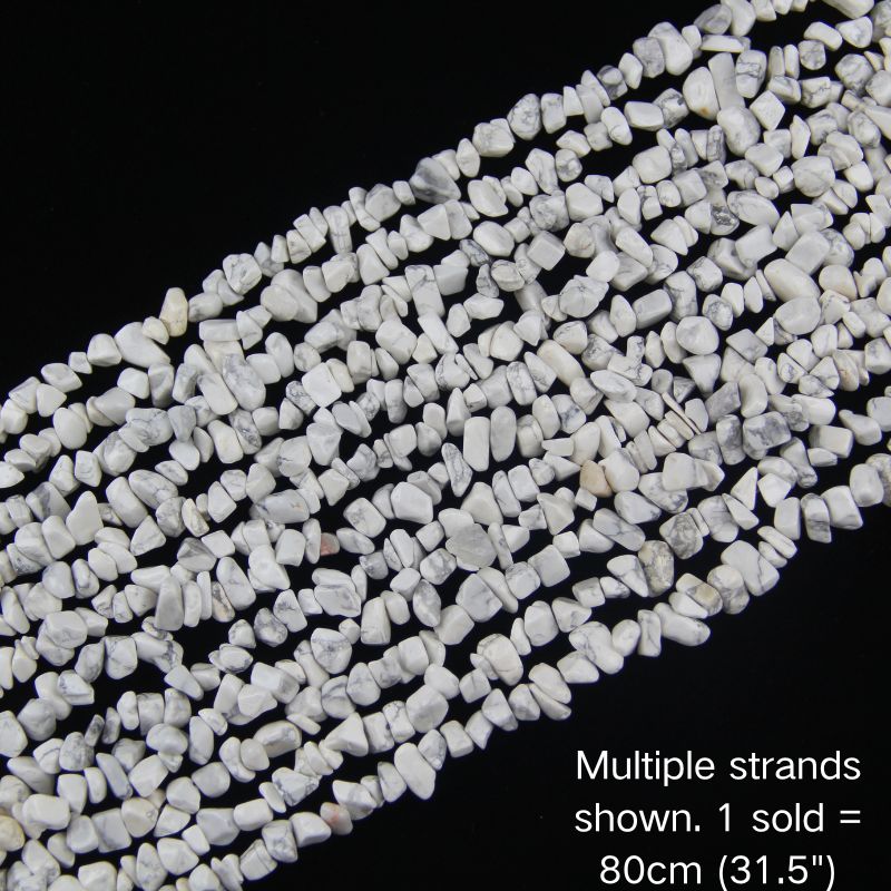 Multiple strands of white howlite chip beads, 5-8mm polished chips, natural grey veining.