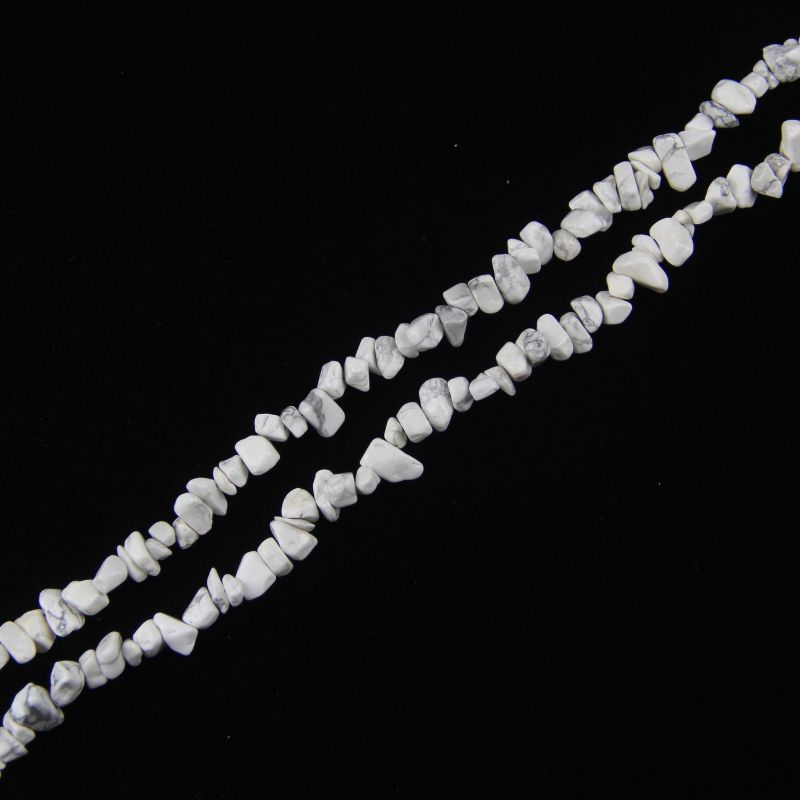 single flat lay of white howlite necklace strand, 31.5 inches, 5-8mm irregular round beads strung on nylon cord