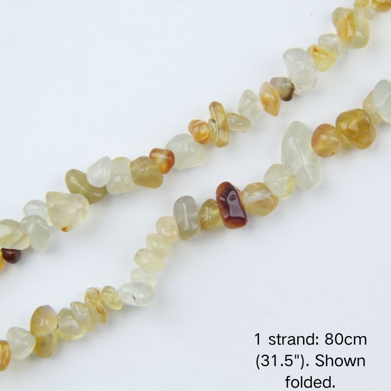 Close-up detail of natural Yellow Agate chip beads, showing 5-8mm irregular nuggets with natural banding inclusions.