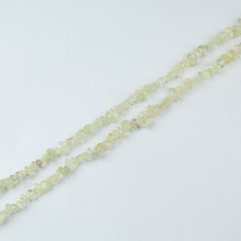 single flat lay of yellow citrine necklace strand, 31.5 inches, 5-8mm irregular round beads strung on nylon cord