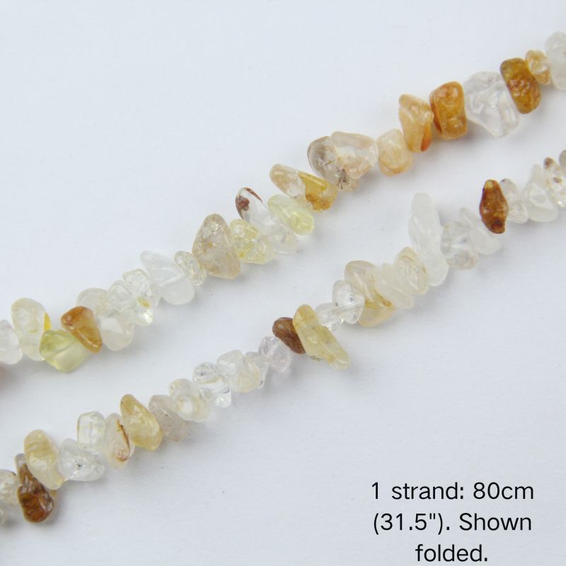 polished translucent surface, yellow/ochre iron oxide patterns, and center-drilled holes.